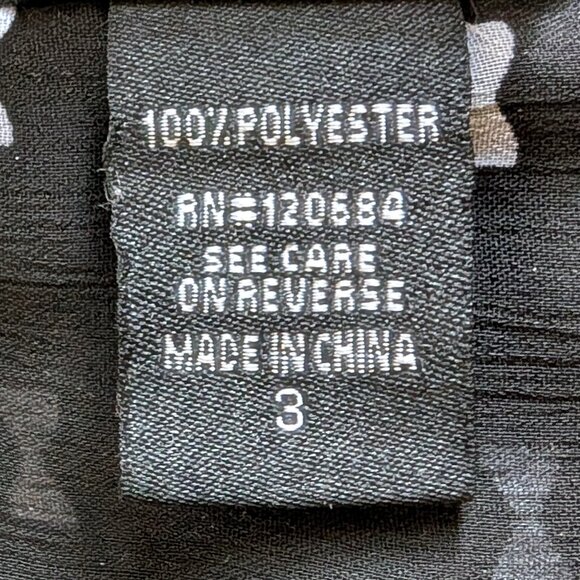 Torrid Bow Print Ruffle Front Blouse in Black & White - Picture 4 of 11